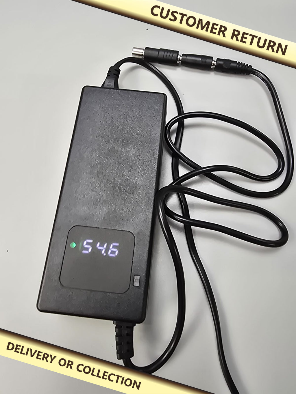 54.6v 2A Fast Charger DC5.5 x 2.1mm, GX12 — photograph 1 — Customer return; auction delivery information shown on image