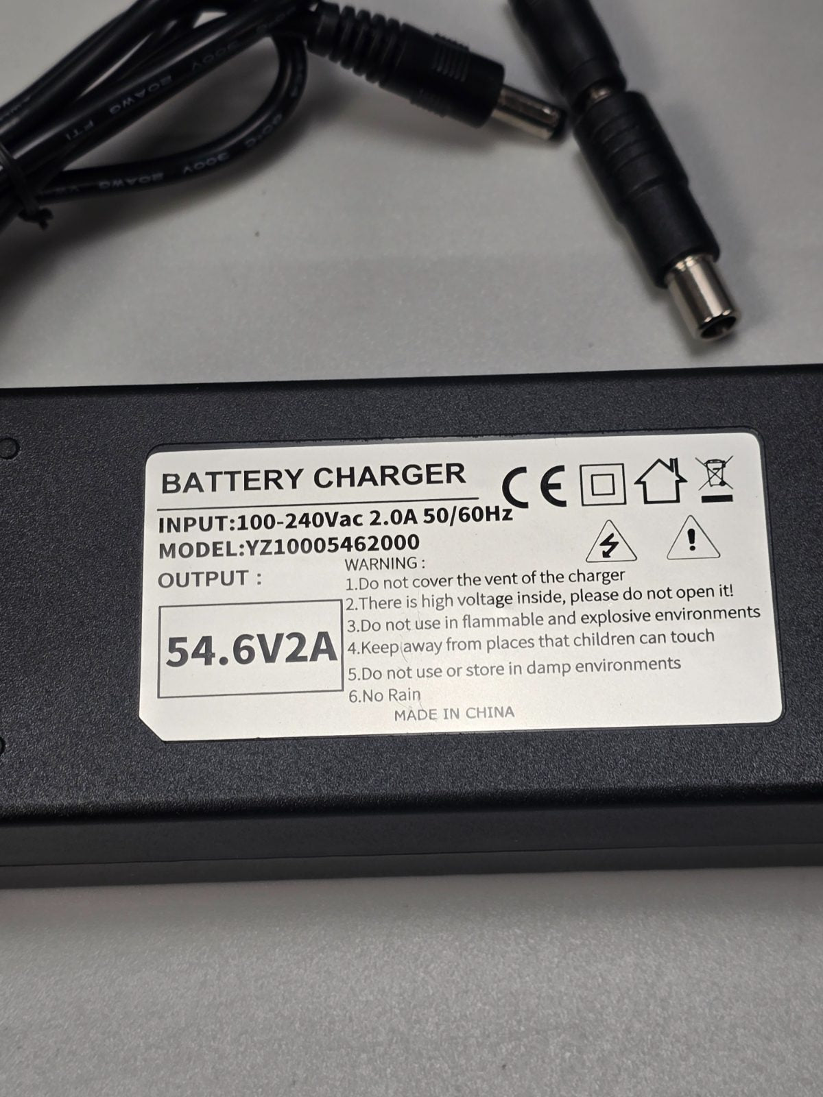 54.6v 2A Fast Charger DC5.5 x 2.1mm, GX12 — photograph 3