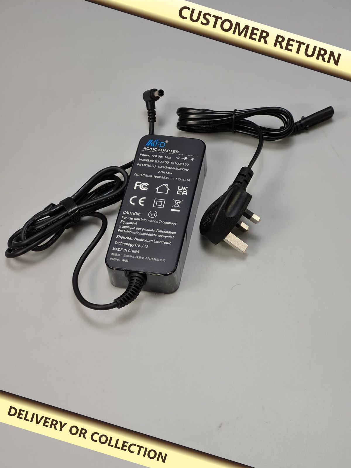 120w Laptop Power Supply 19.5v 5.2A output — photograph 1 — Customer return; auction delivery information shown on image
