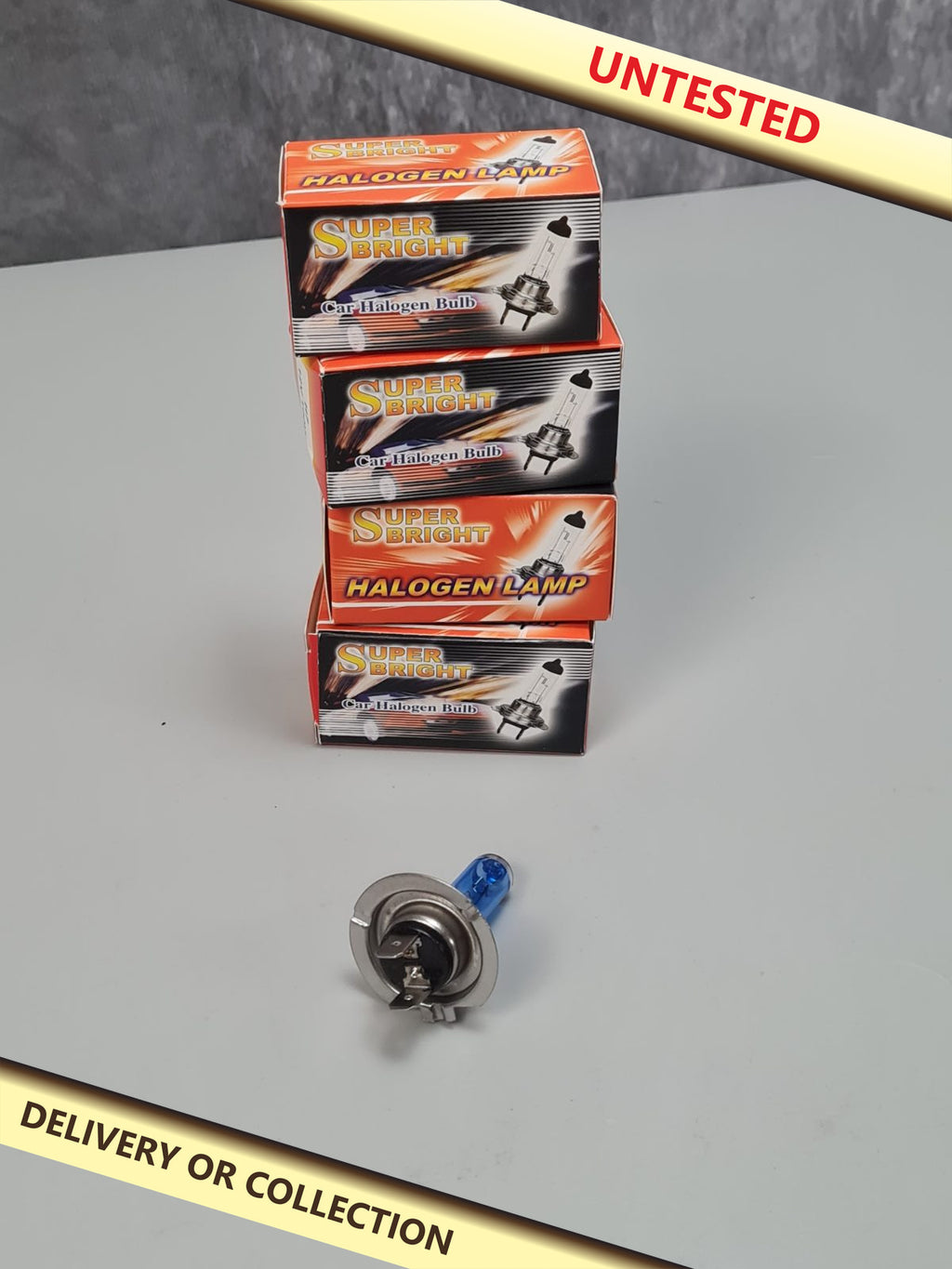4pc h7 headlight bulbs — photograph 1 — Untested; auction delivery information shown on image