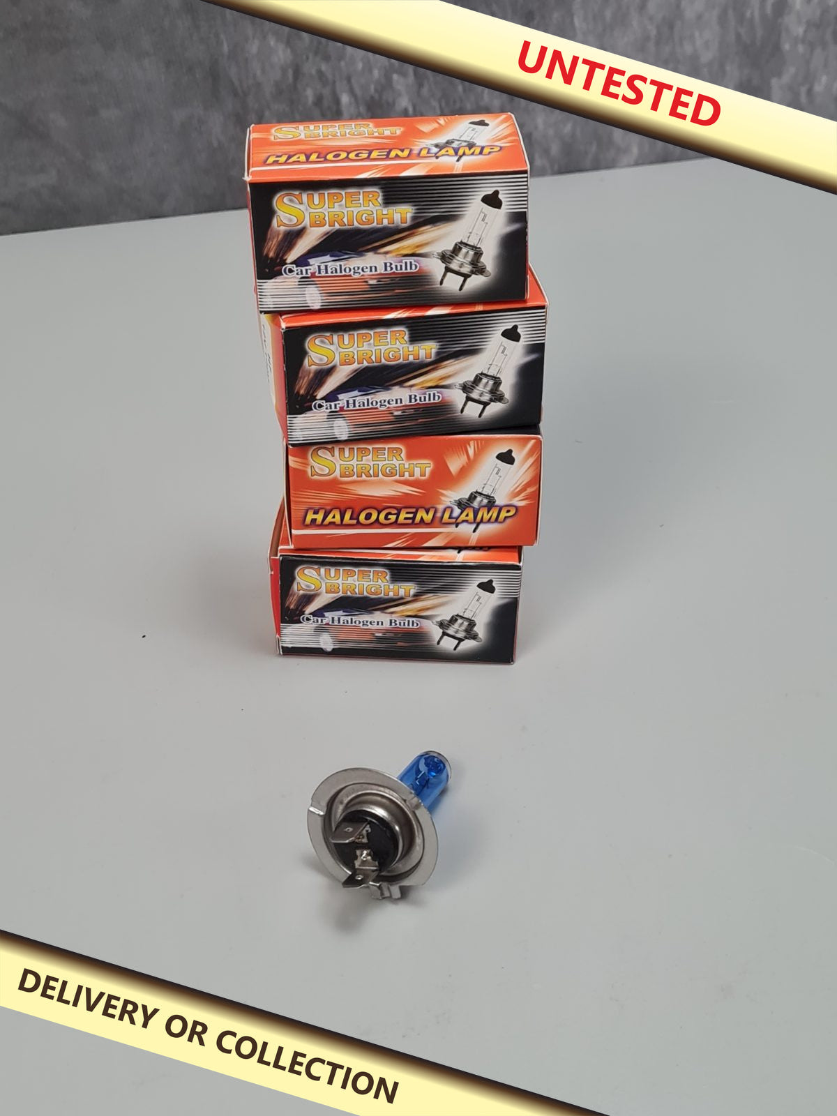 4pc h7 headlight bulbs — photograph 1 — Untested; auction delivery information shown on image