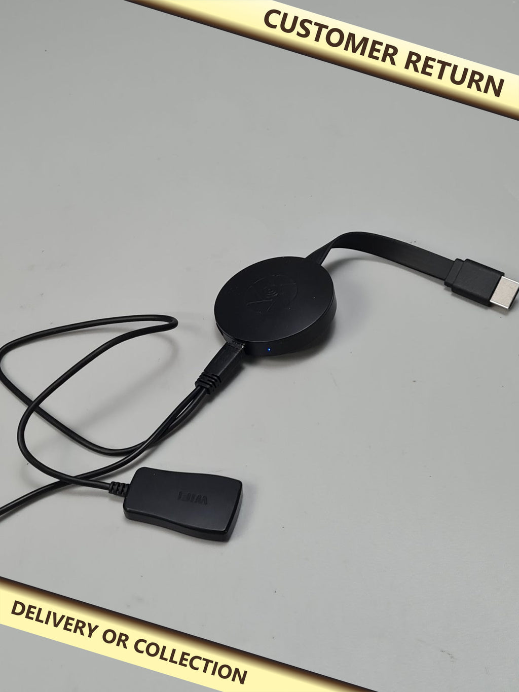 Wireless HDMI Display Dongle — photograph 1 — Customer return; auction delivery information shown on image