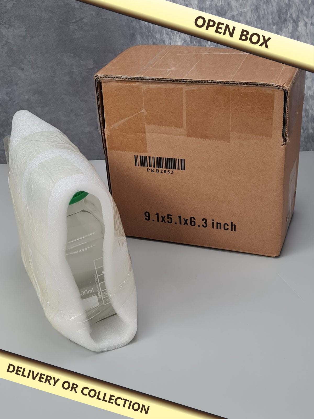 500ml Glass Bottles with Lids 2 pack — photograph 1 — Open box; auction delivery information shown on image