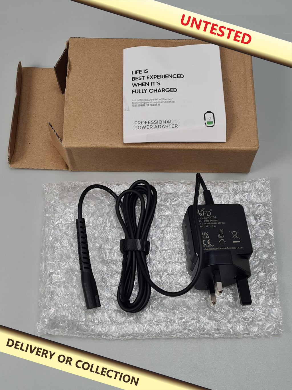 4V 2A charger for professional Razor — photograph 1 — Untested; auction delivery information shown on image