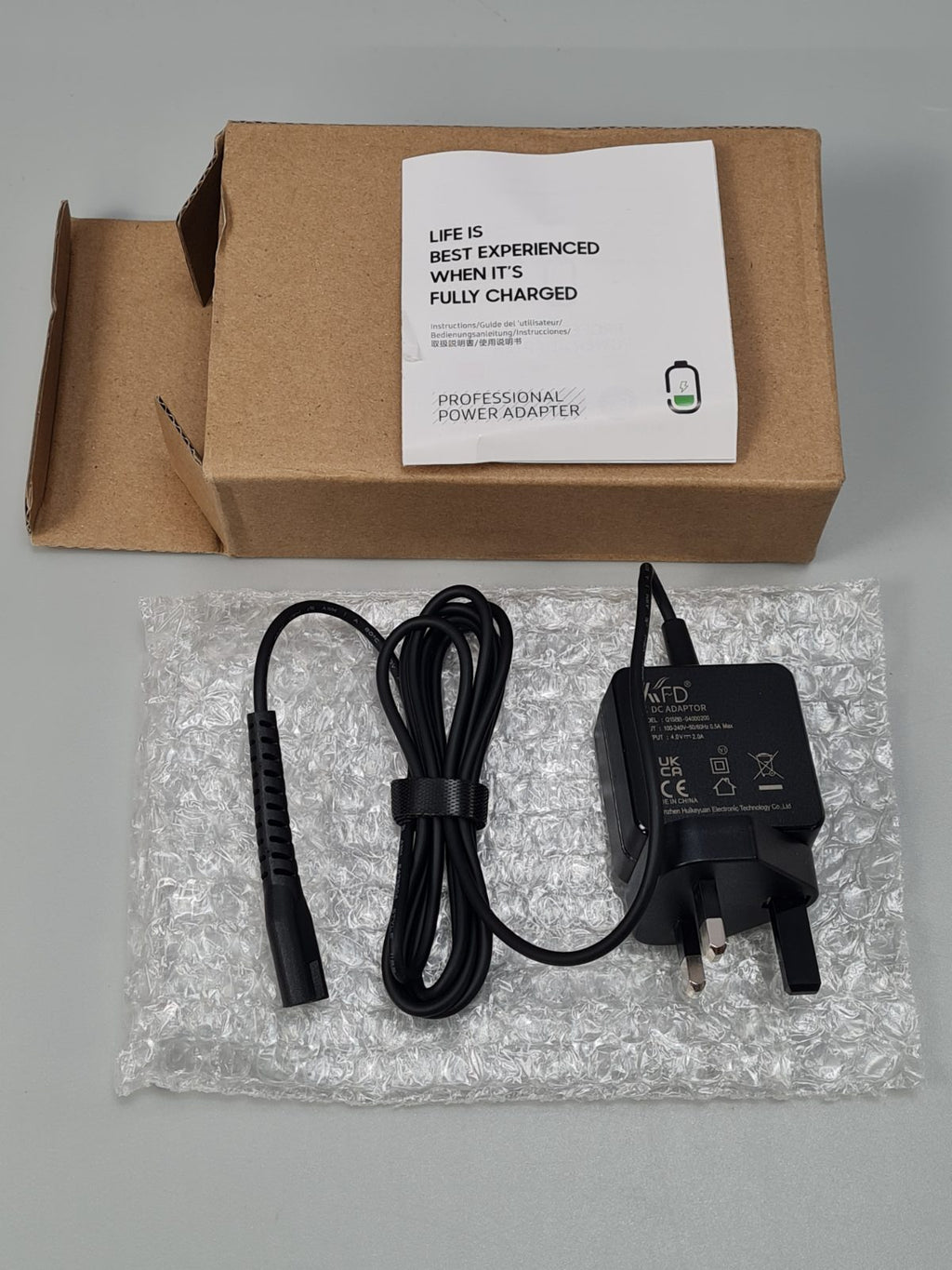 4V 2A charger for professional Razor — photograph 1