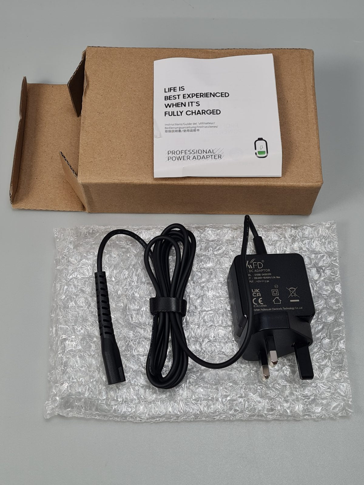4V 2A charger for professional Razor — photograph 1