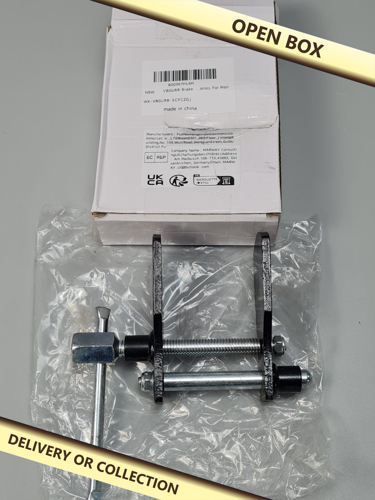 Brake Caliper Rewind Tool — photograph 1 — Open box; auction delivery information shown on image