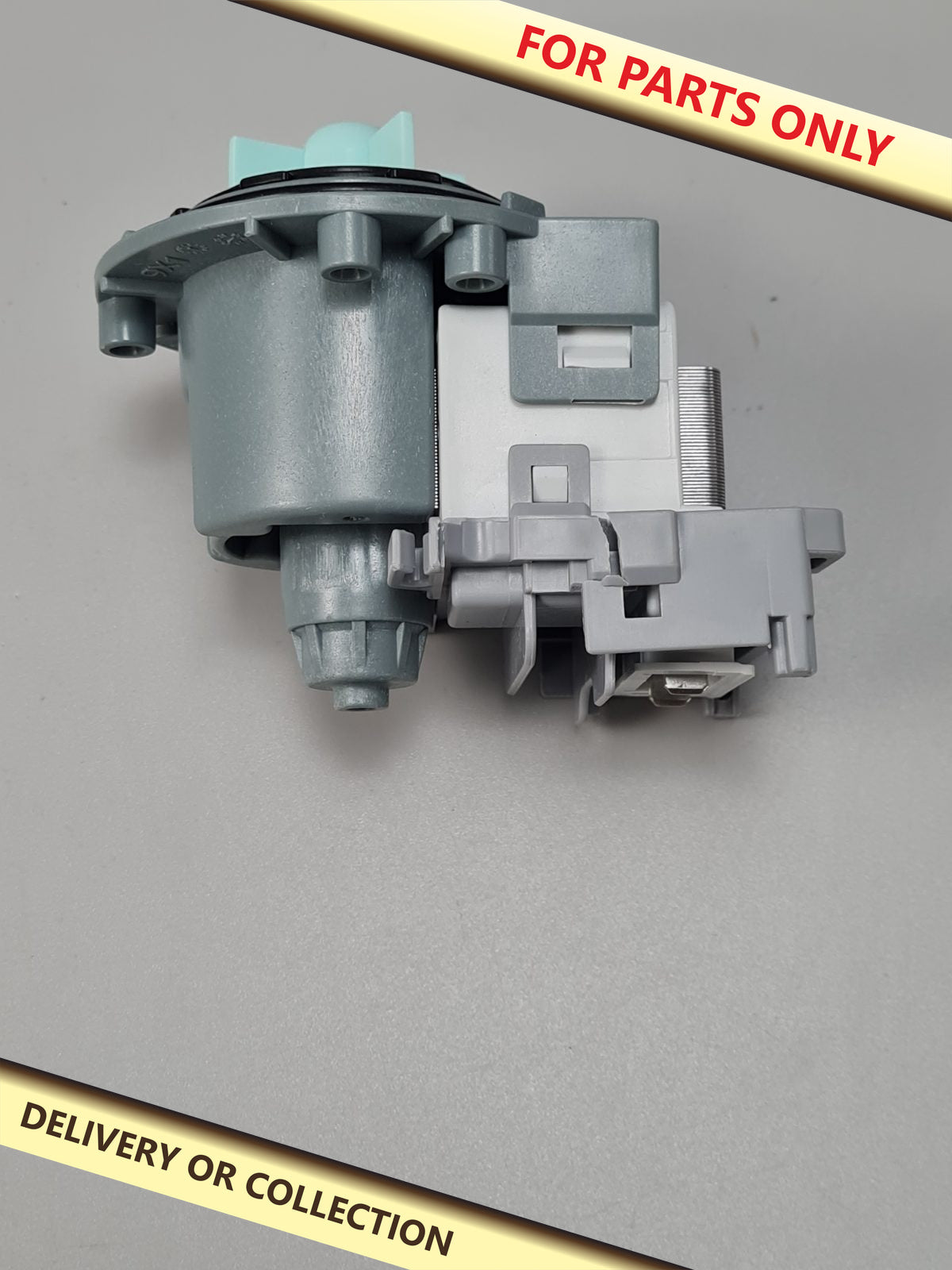 Washing machine drain pump motor — photograph 1 — For parts only; auction delivery information shown on image