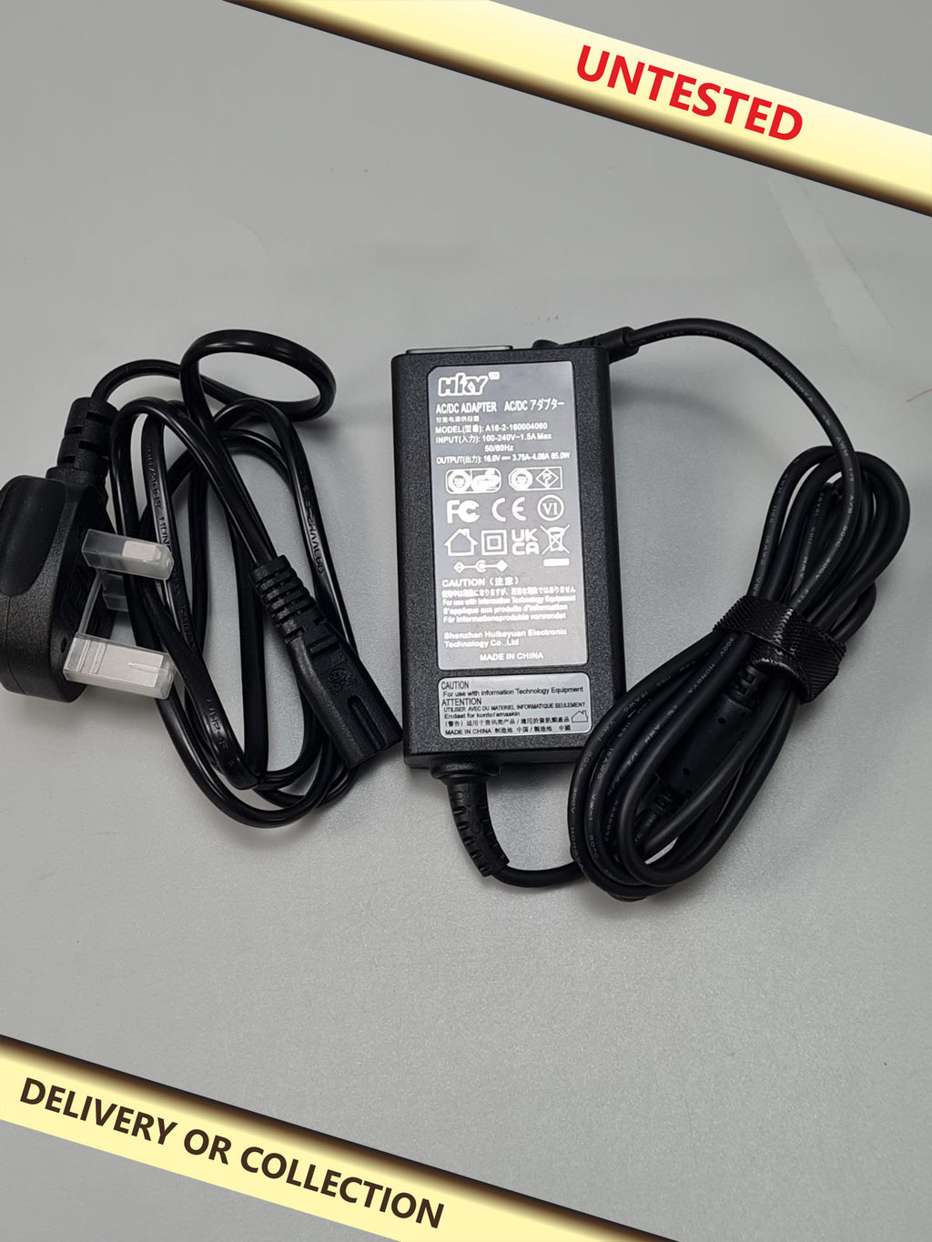 AC/DC adapter 240V 1.5A max — photograph 1 — Untested; auction delivery information shown on image
