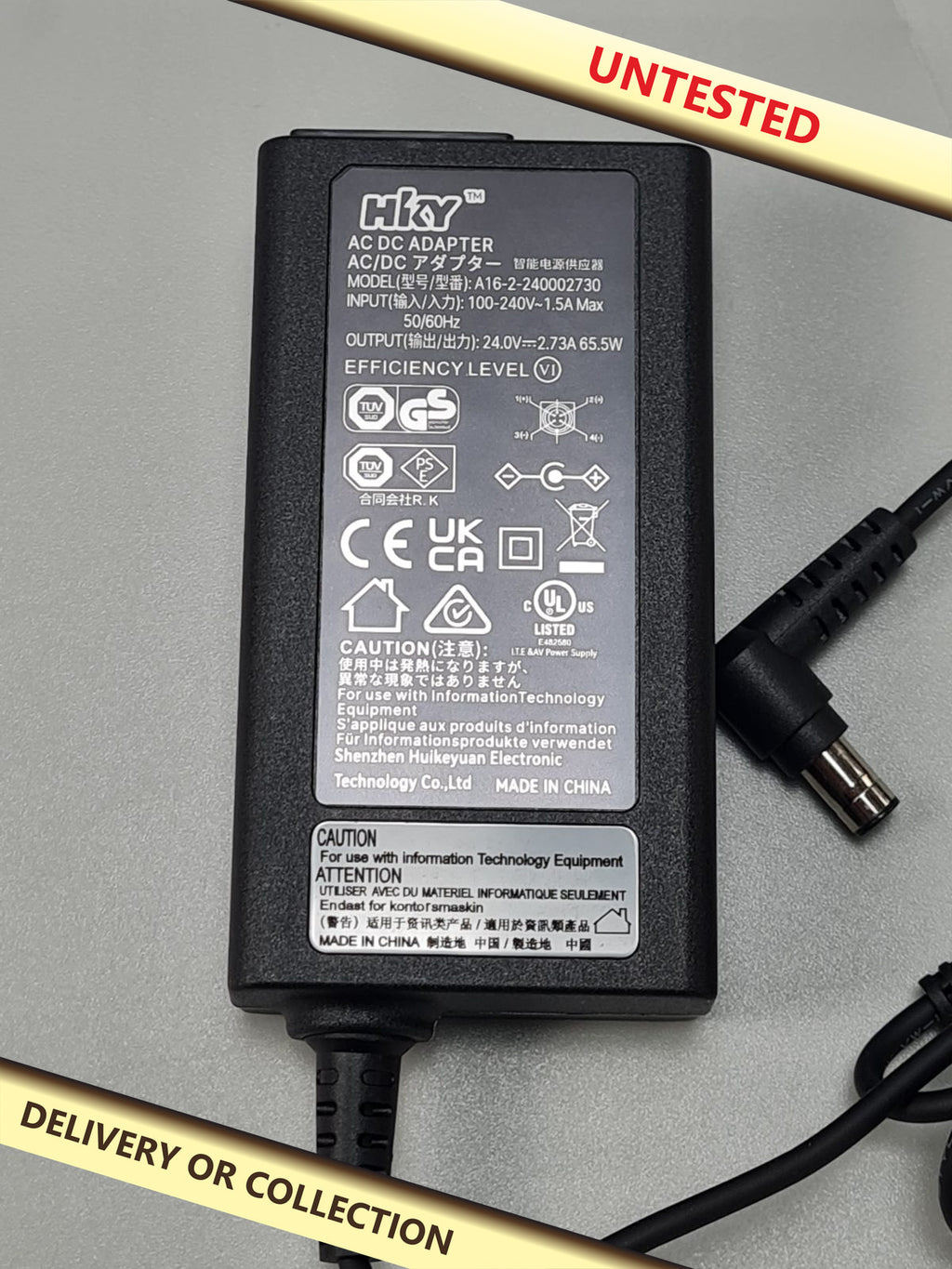 AC/DC adapter — photograph 1 — Untested; auction delivery information shown on image