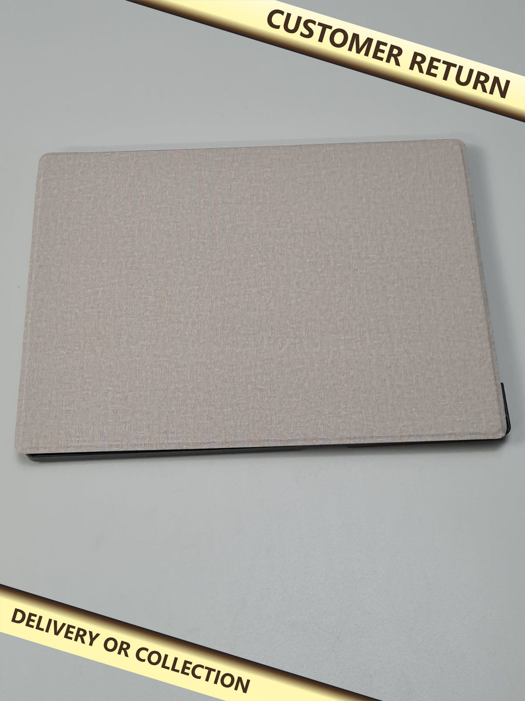 Case for reMarkable e-readers in gray — photograph 1 — Customer return; auction delivery information shown on image