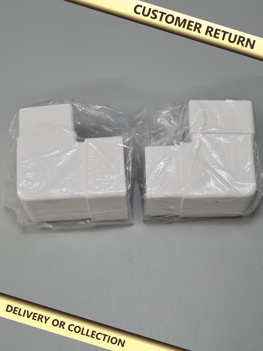 Offset downpipe bends — photograph 1 — Customer return; auction delivery information shown on image