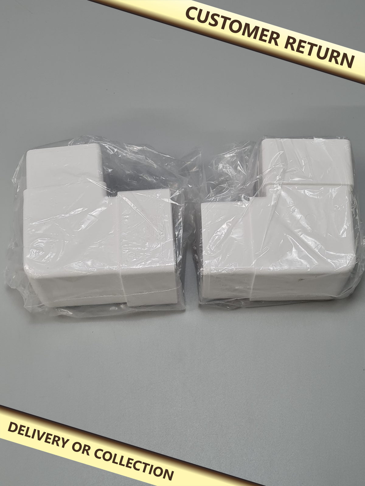 Offset downpipe bends — photograph 1 — Customer return; auction delivery information shown on image
