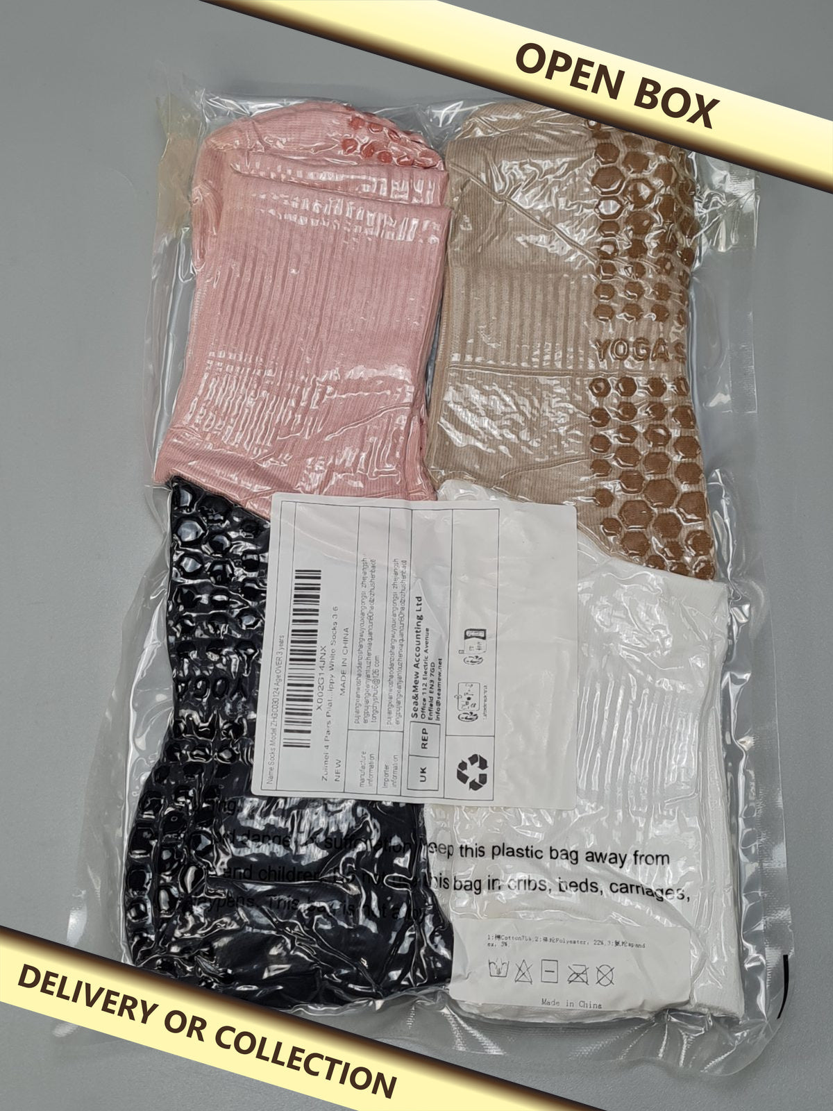 4 pairs of socks size 3-6 — photograph 1 — Open box; auction delivery information shown on image