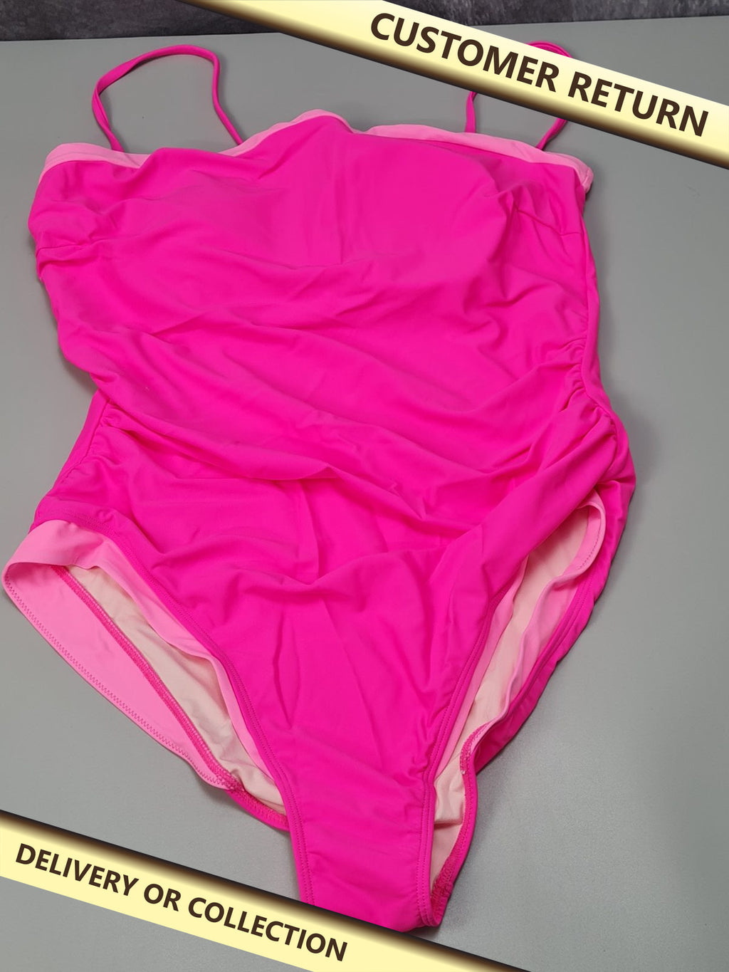 Ladies pink swimming costume — photograph 1 — Customer return; auction delivery information shown on image