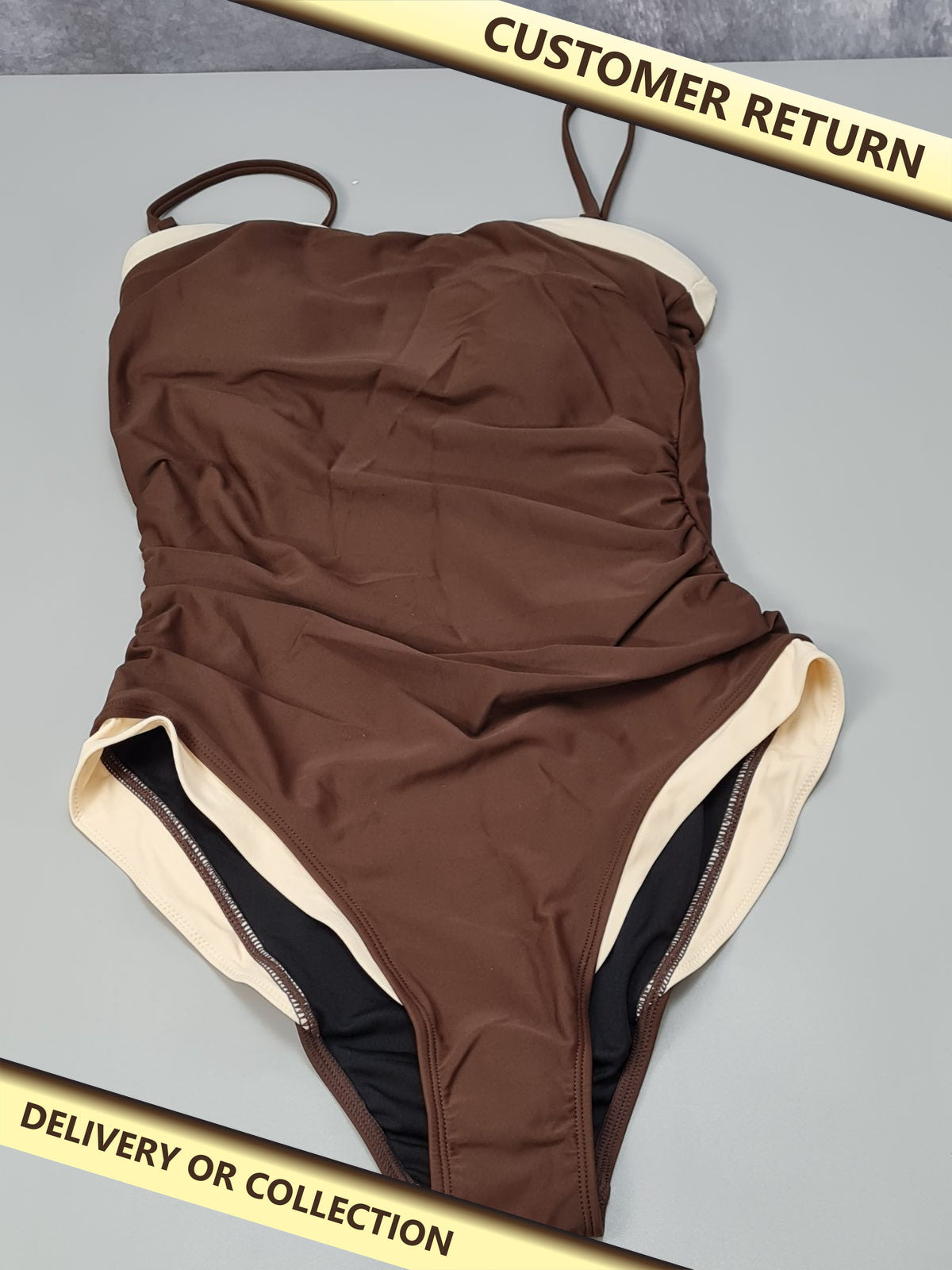 Ladies one piece swimming costume — photograph 1 — Customer return; auction delivery information shown on image