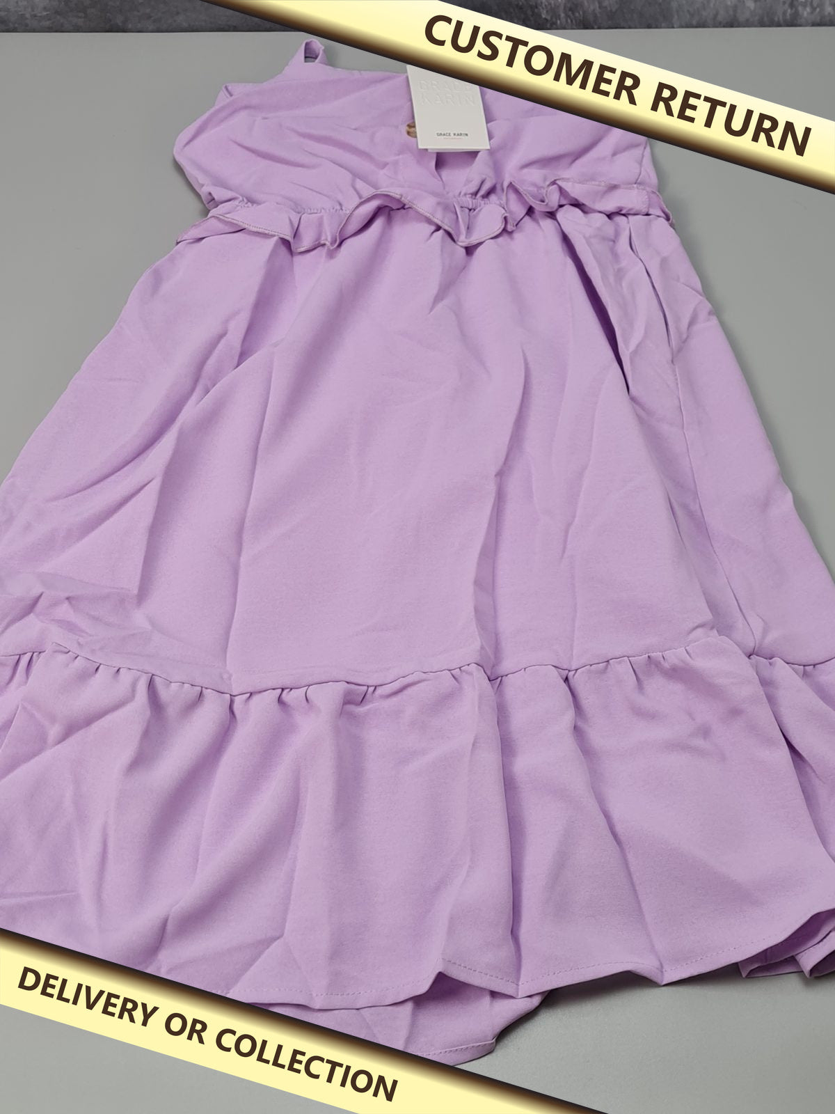 Girls lilac summer dress — photograph 1 — Customer return; auction delivery information shown on image