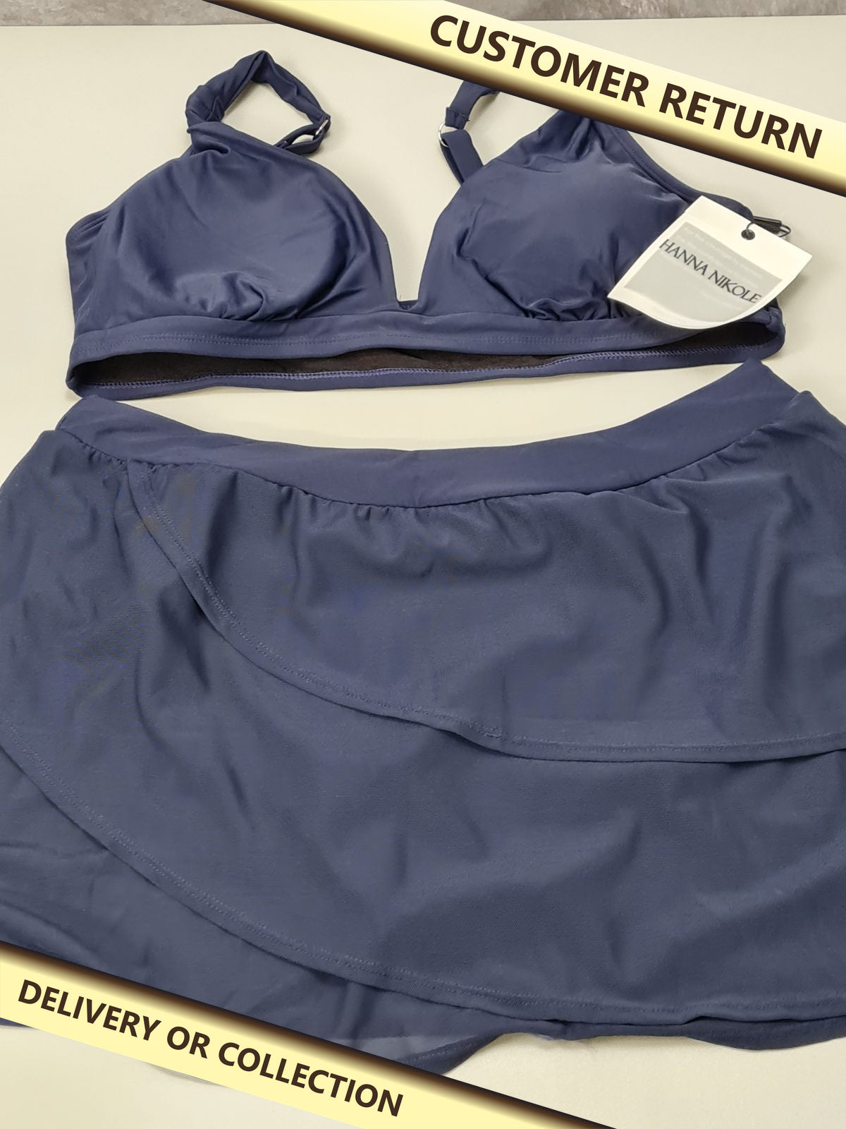 Ladies navy bikini size XL — photograph 1 — Customer return; auction delivery information shown on image
