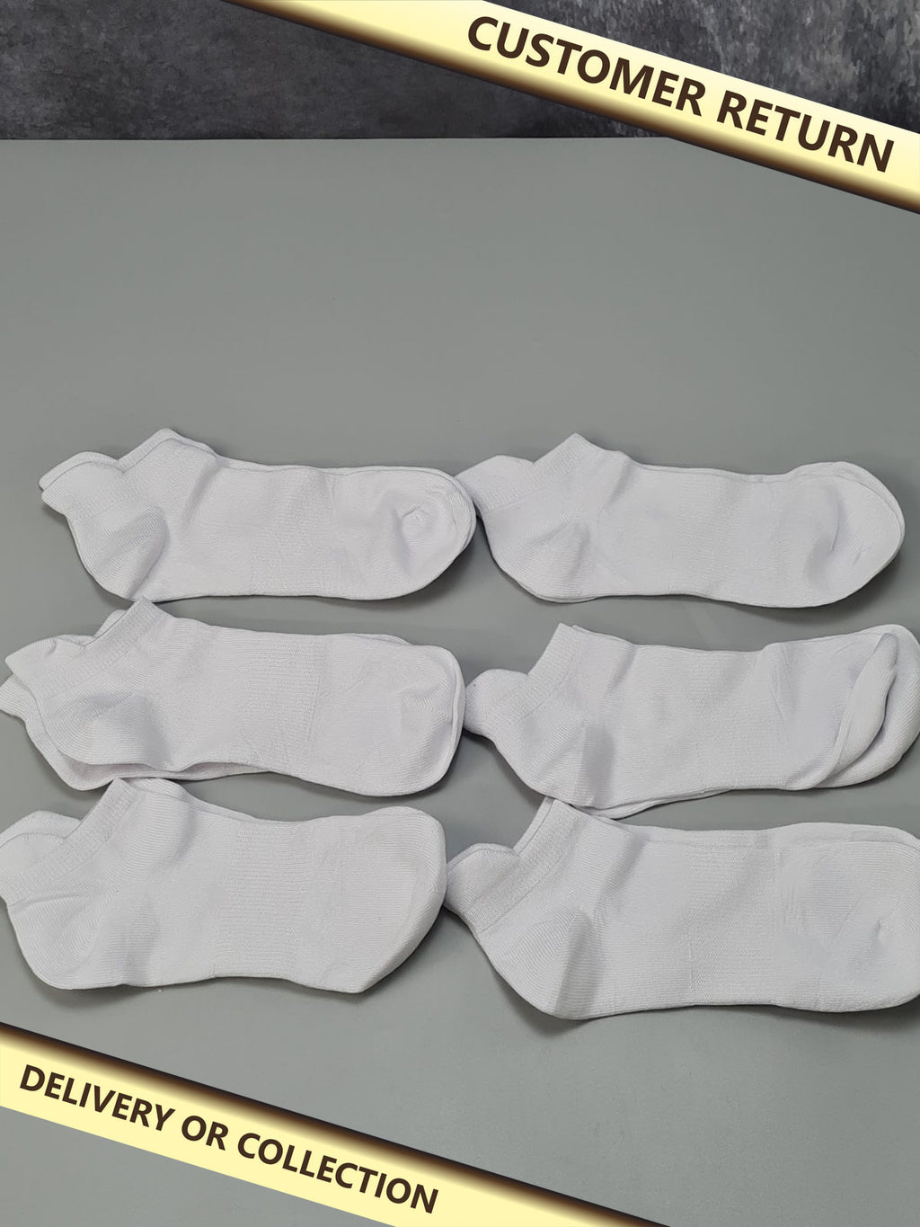6 Pairs of White Socks — photograph 1 — Customer return; auction delivery information shown on image