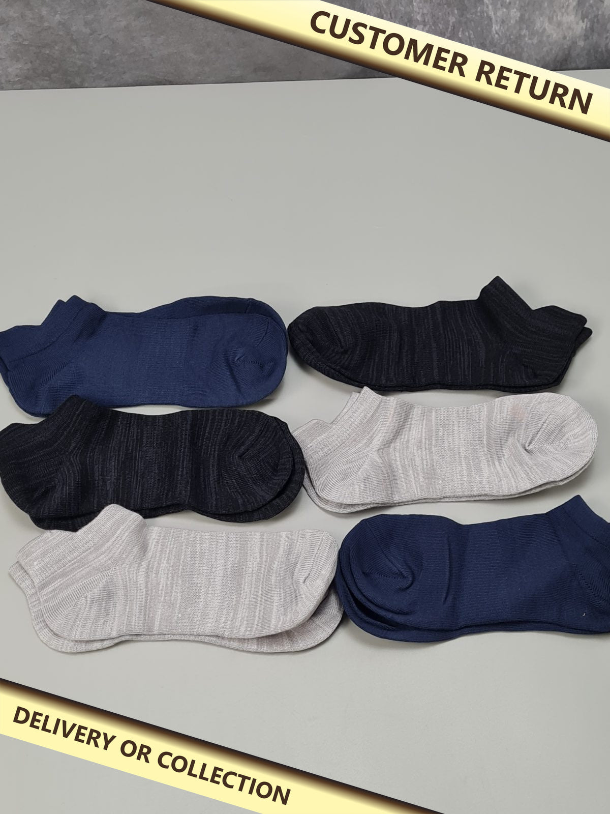 6 pairs of trainer socks — photograph 1 — Customer return; auction delivery information shown on image