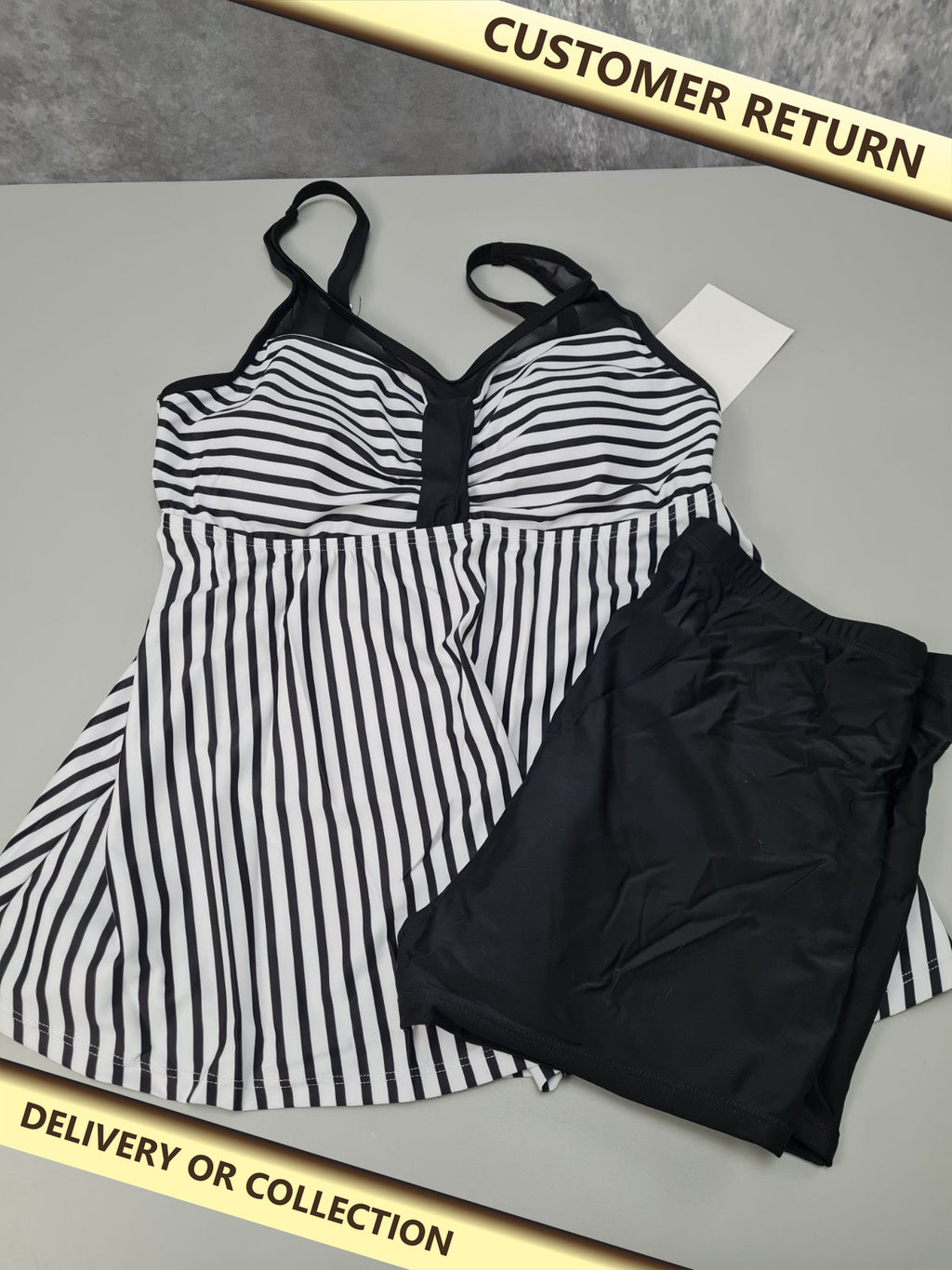 Ladies black and white bikini size L — photograph 1 — Customer return; auction delivery information shown on image