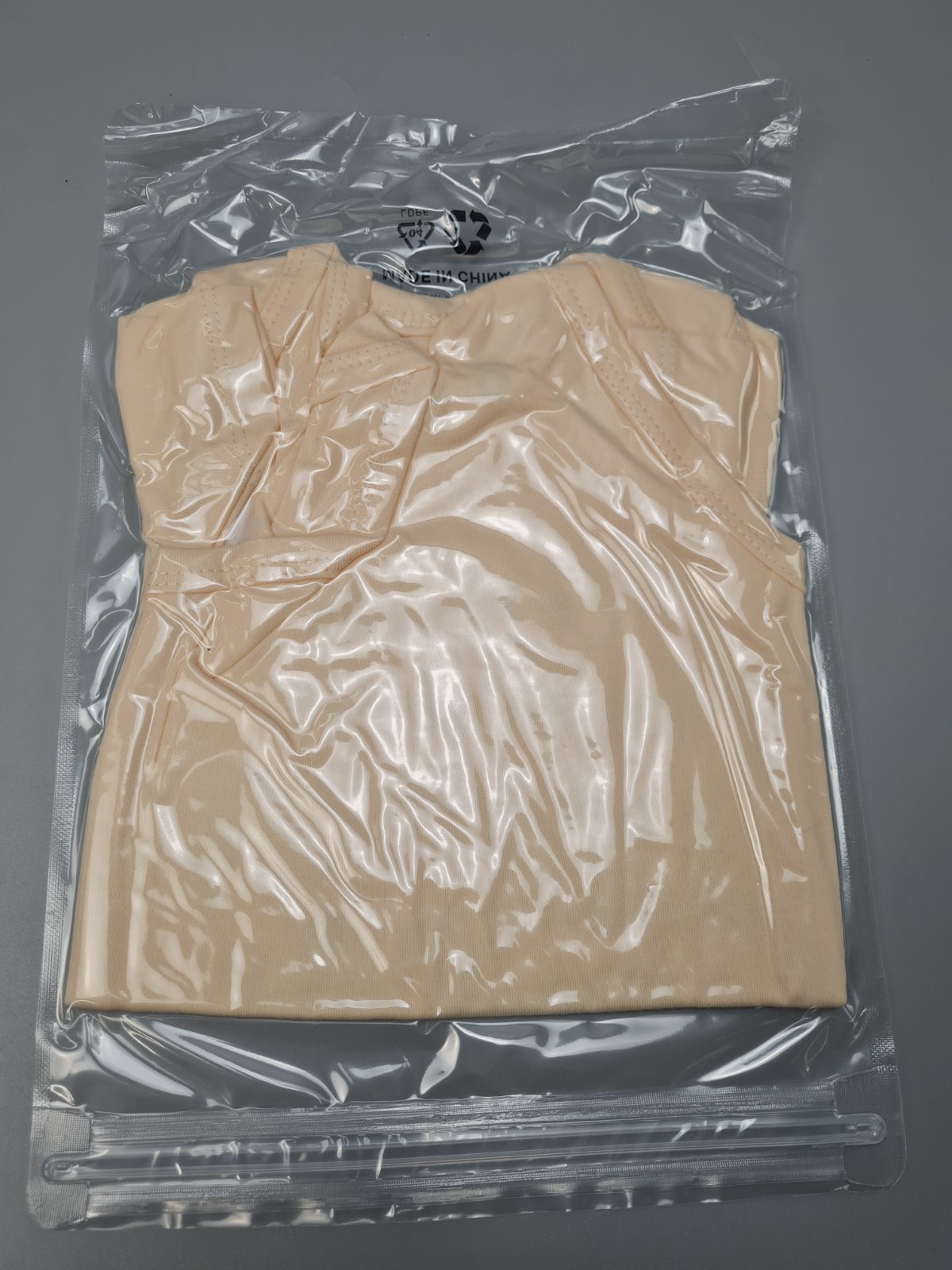 Baby bodysuit in nude age 3-6 months — photograph 3