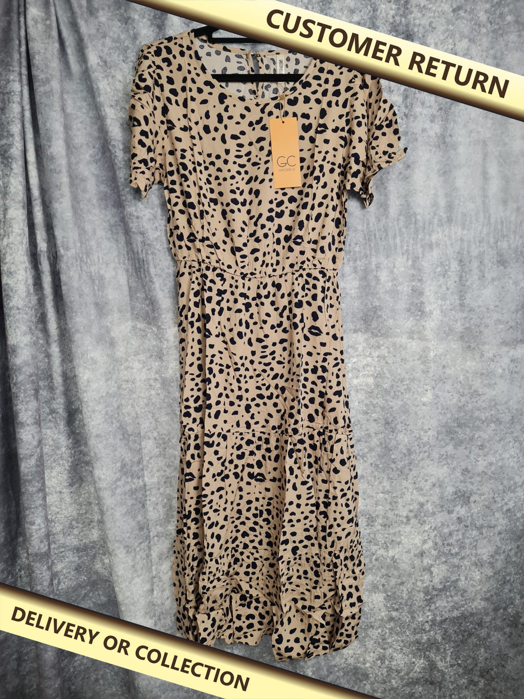 Ladies Tan Dress with Navy spots size S — photograph 1 — Customer return; auction delivery information shown on image