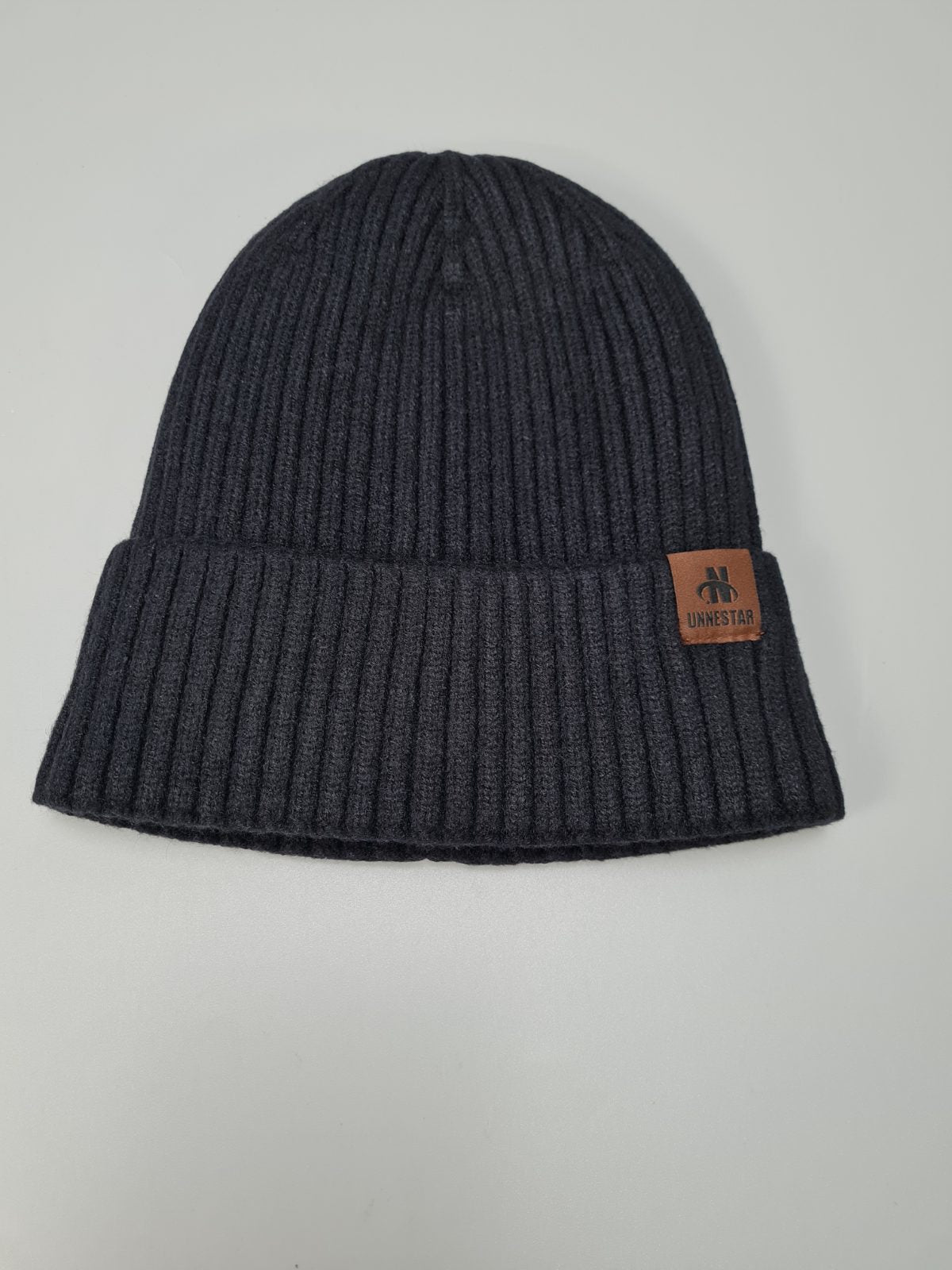 Black knitted winter hat — photograph 2