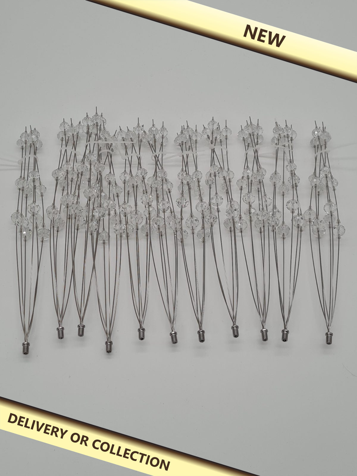 Replacement arms for a dandelion chandelierr 11 pack — photograph 1 — New; auction delivery information shown on image