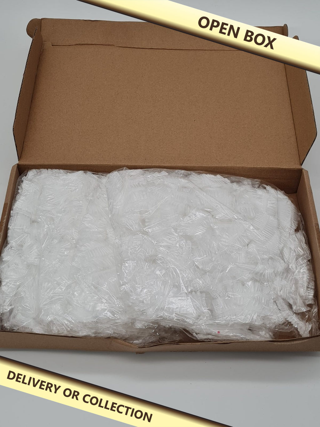 Deposable ear covers pack of 100 — photograph 1 — Open box; auction delivery information shown on image