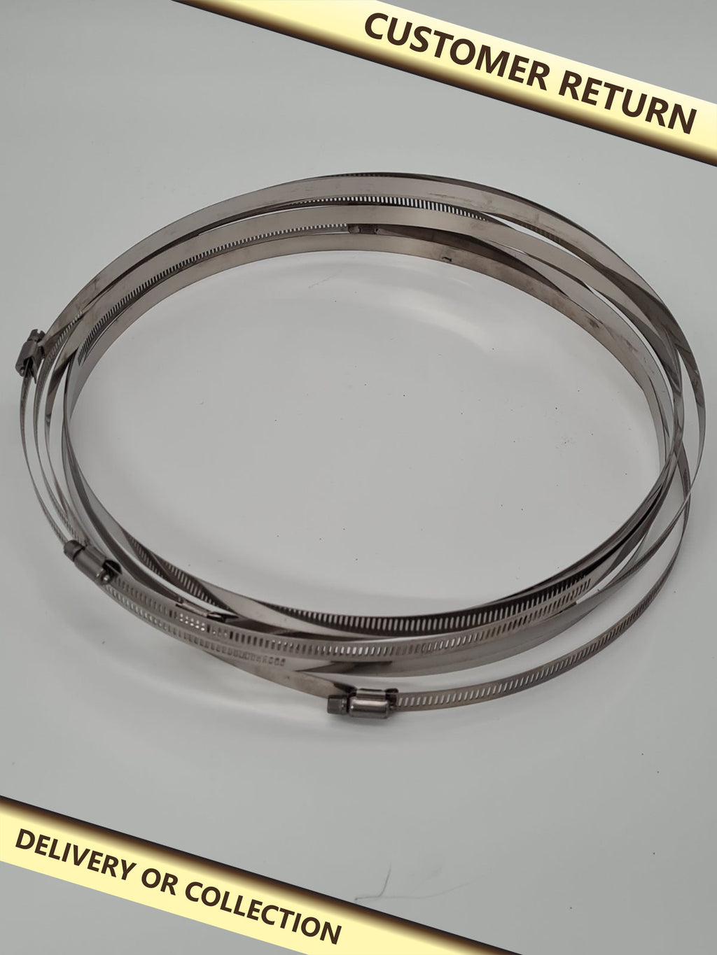 7pcs 11.5 - 12 inch caterpillar v band clamp. — photograph 1 — Customer return; auction delivery information shown on image