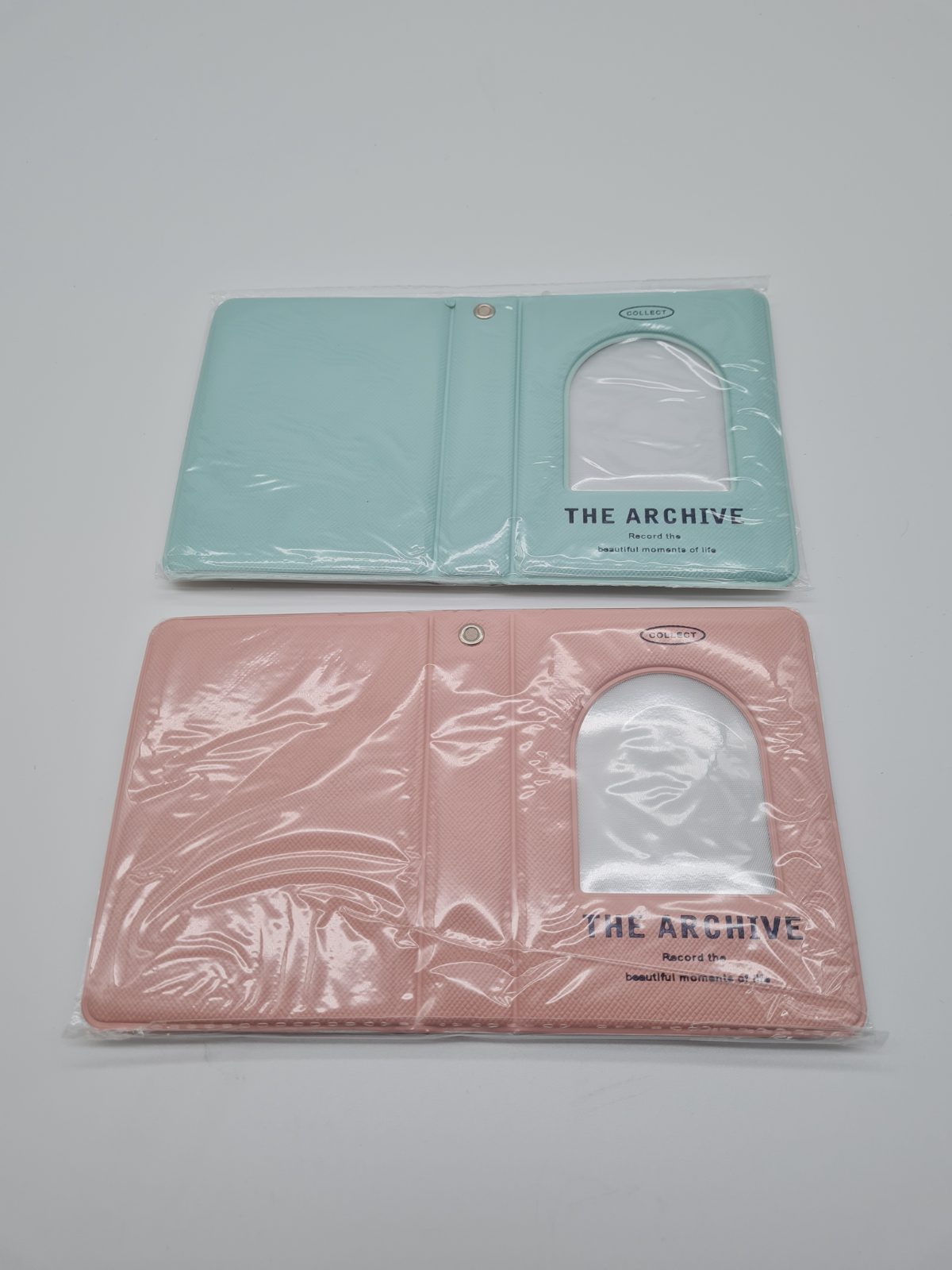 Pair of photo albums with cover windows — photograph 1
