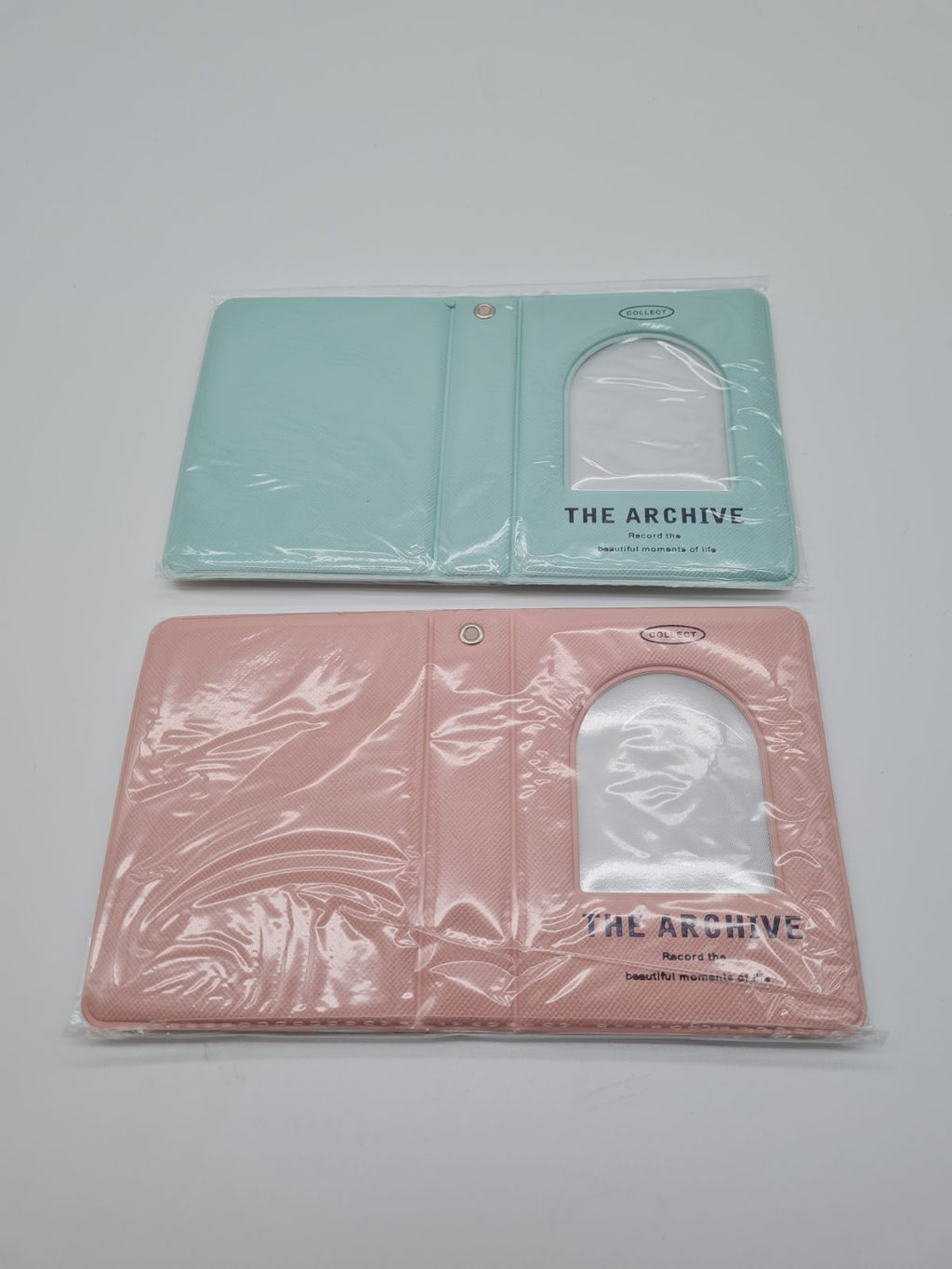 Pair of photo albums with cover windows — photograph 1