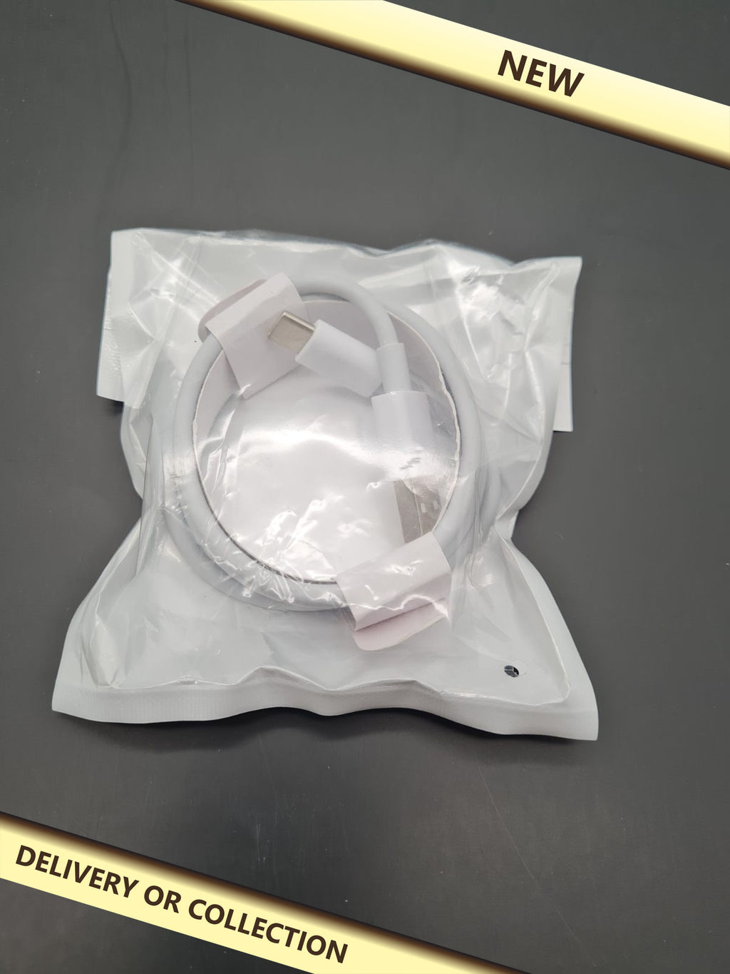USB-C Charging Cable — photograph 1 — New; auction delivery information shown on image