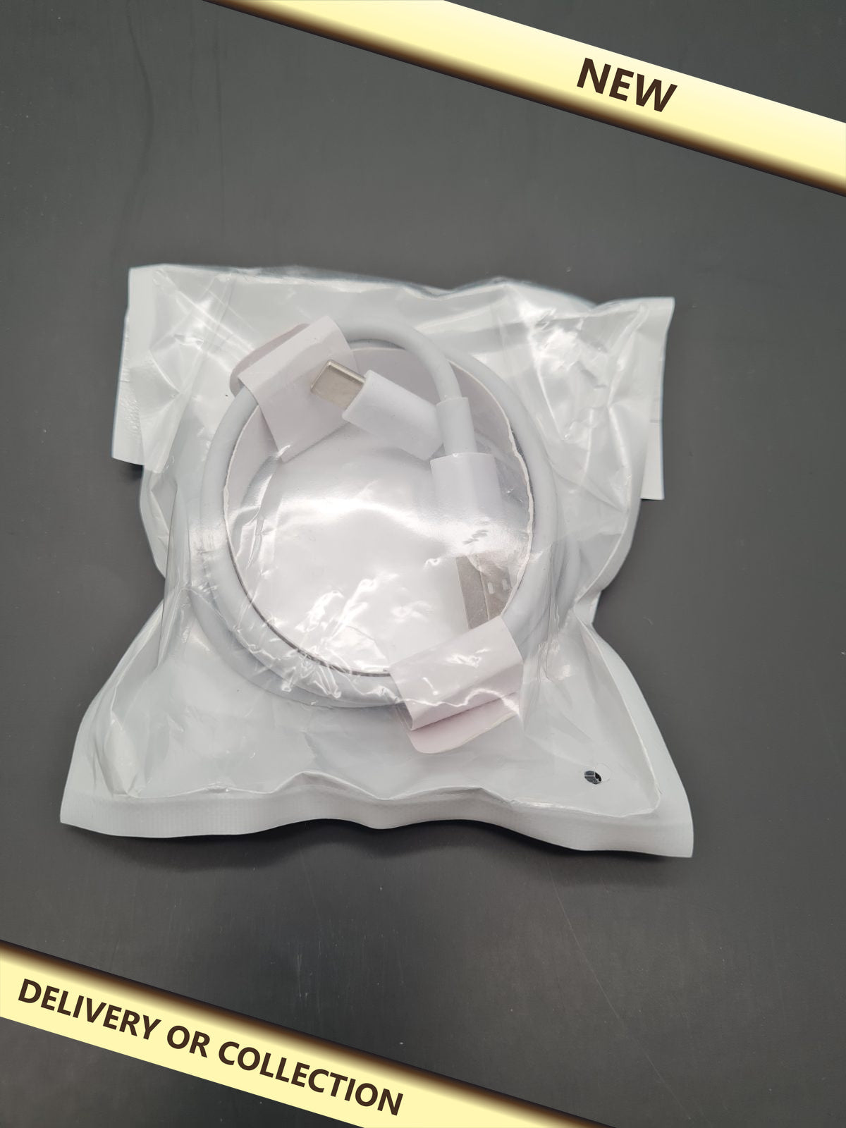 USB-C Charging Cable — photograph 1 — New; auction delivery information shown on image