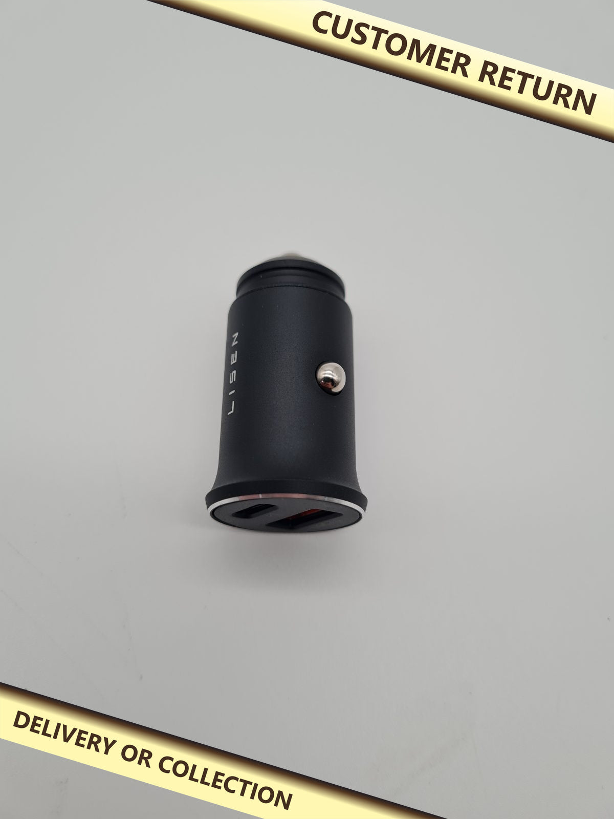Dual USB Car Charger Z25 — photograph 1 — Customer return; auction delivery information shown on image