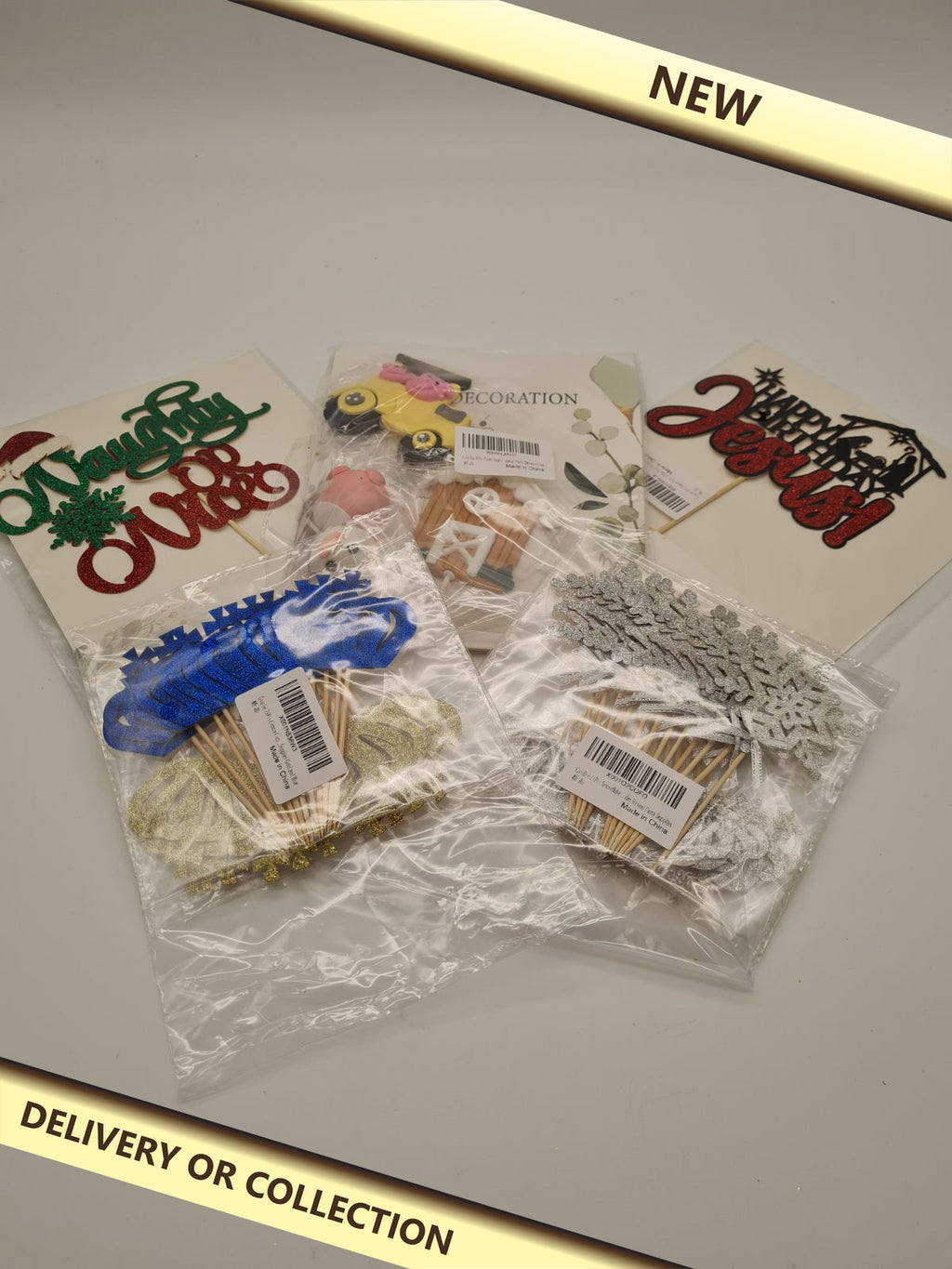 5 packs of different cake toppers — photograph 1 — New; auction delivery information shown on image
