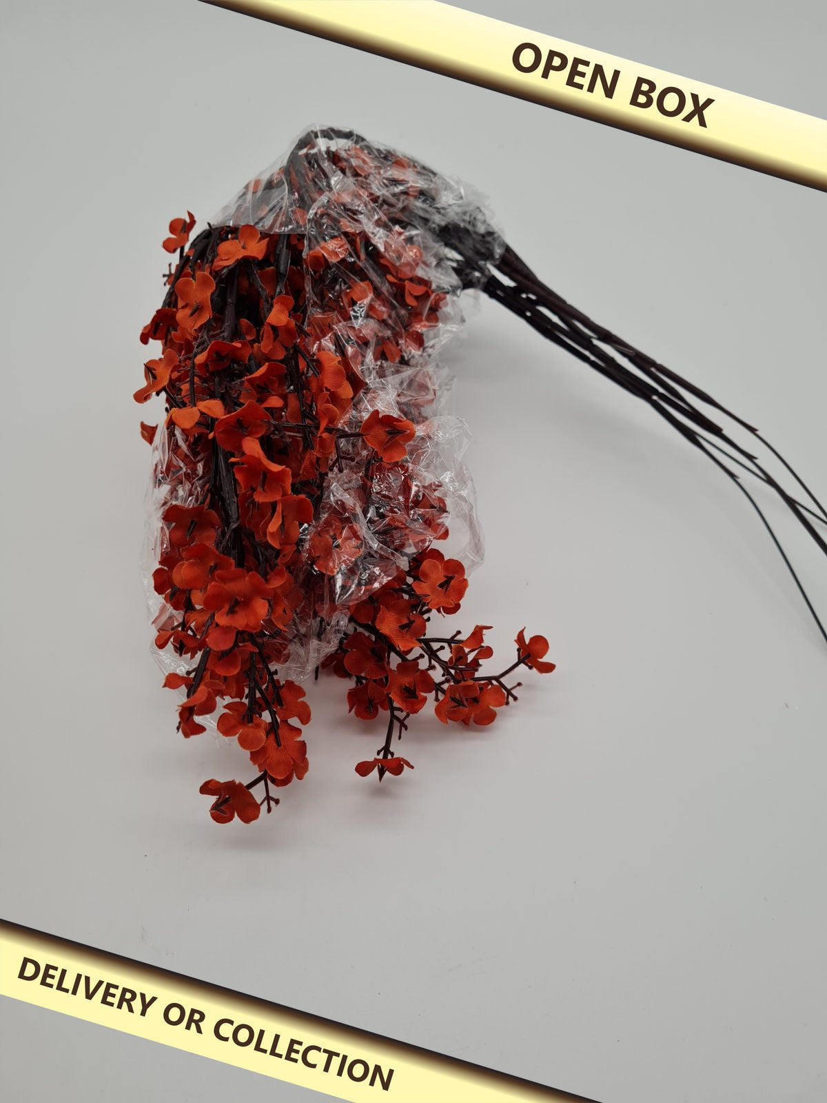 Artificial Orange Flower Stems — photograph 1 — Open box; auction delivery information shown on image