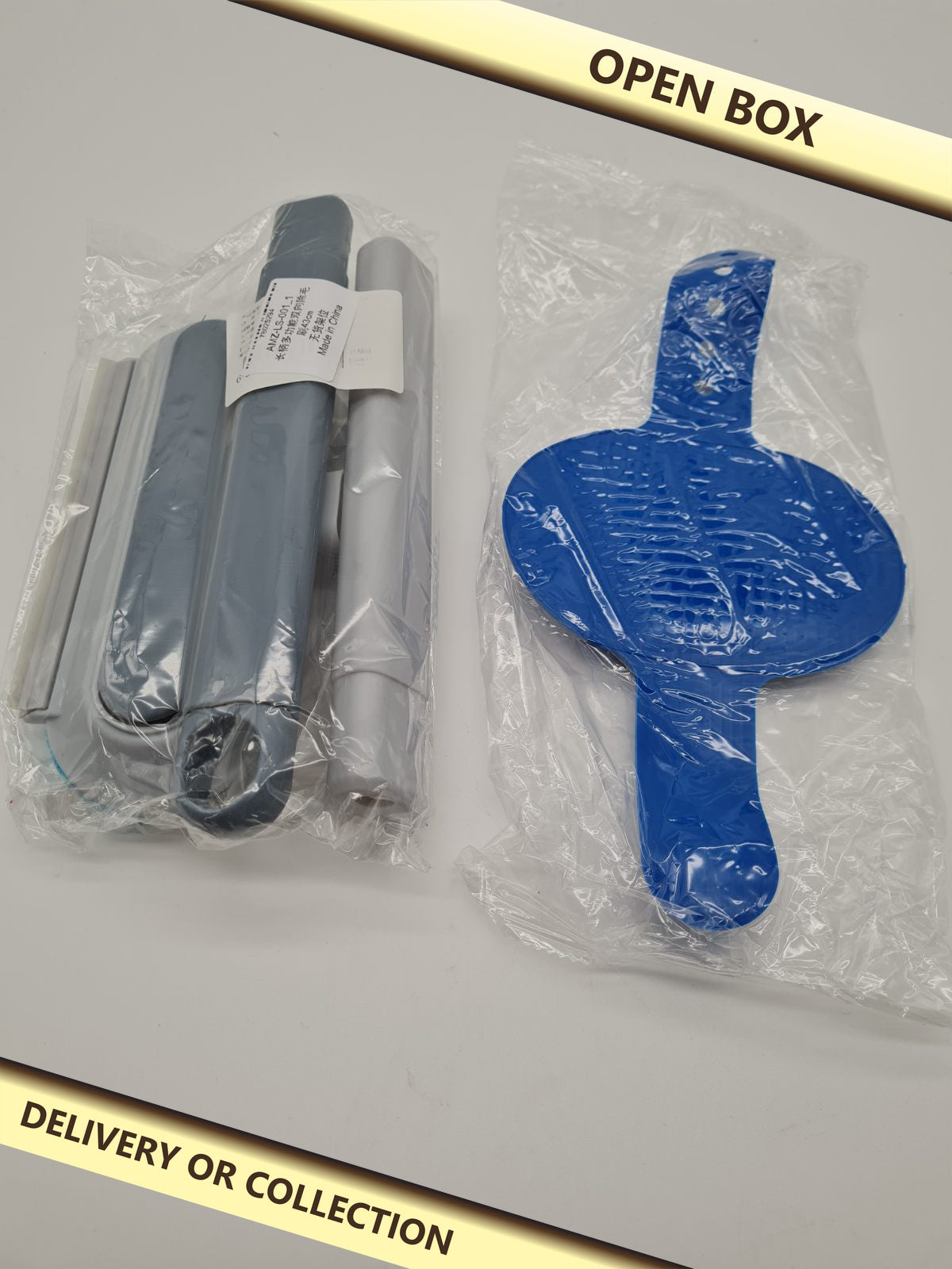 Unknown item — photograph 1 — Open box; auction delivery information shown on image