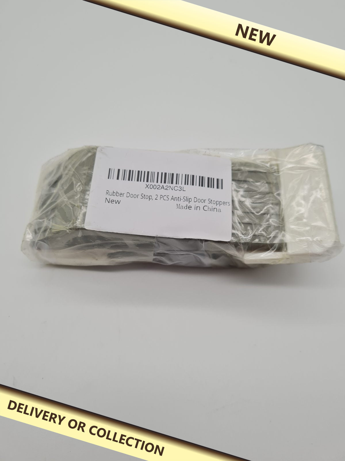 Rubber Door Stops - 2 Pair — photograph 1 — New; auction delivery information shown on image