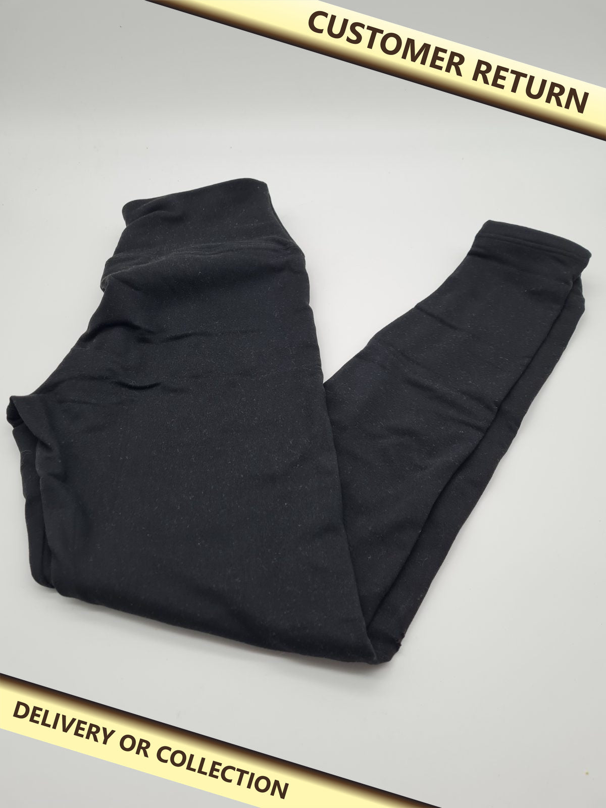 Black legging size S/M — photograph 1 — Customer return; auction delivery information shown on image