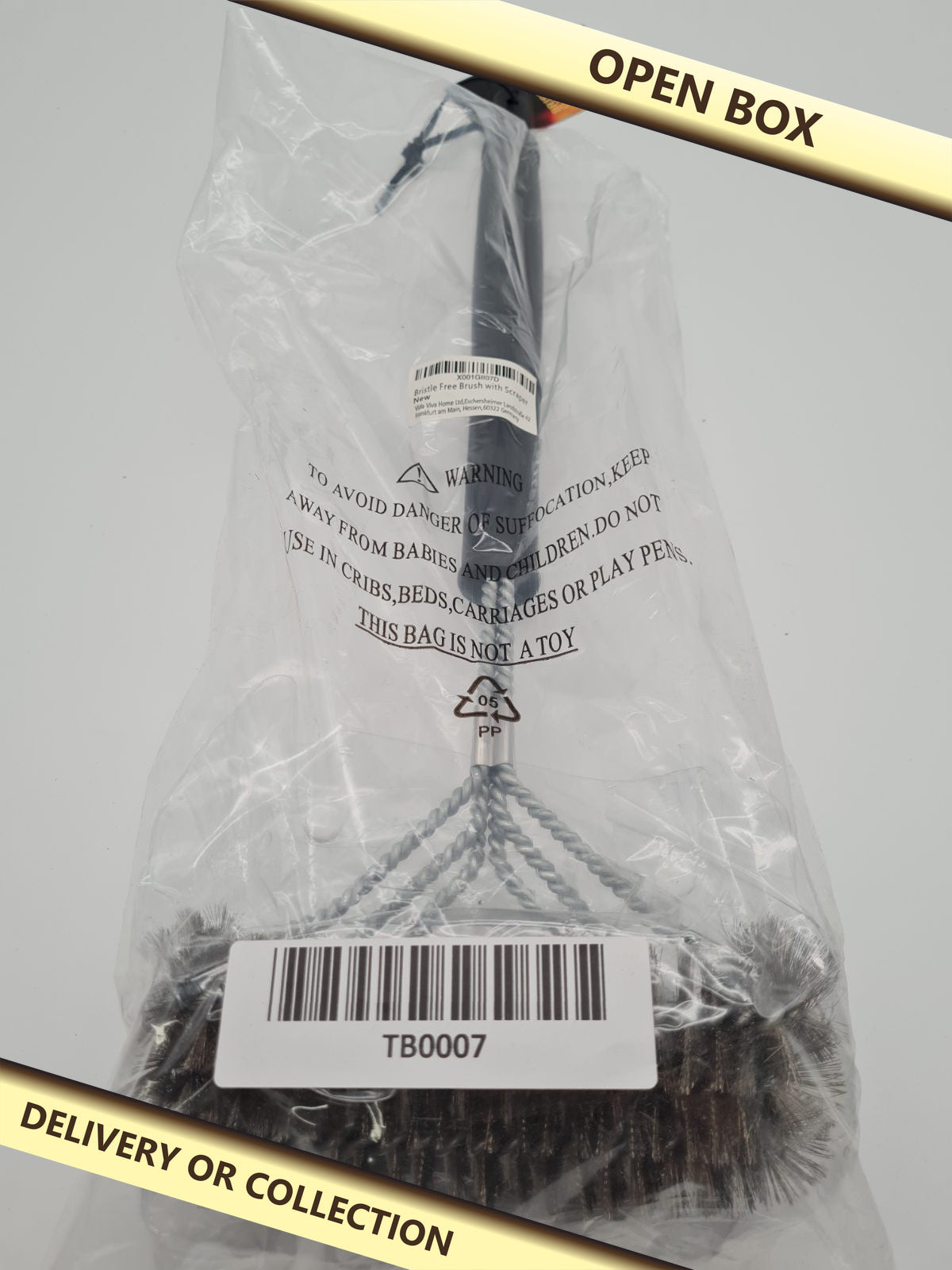 Bristle-Free BBQ Grill Cleaning Brush with Scraper — photograph 1 — Open box; auction delivery information shown on image