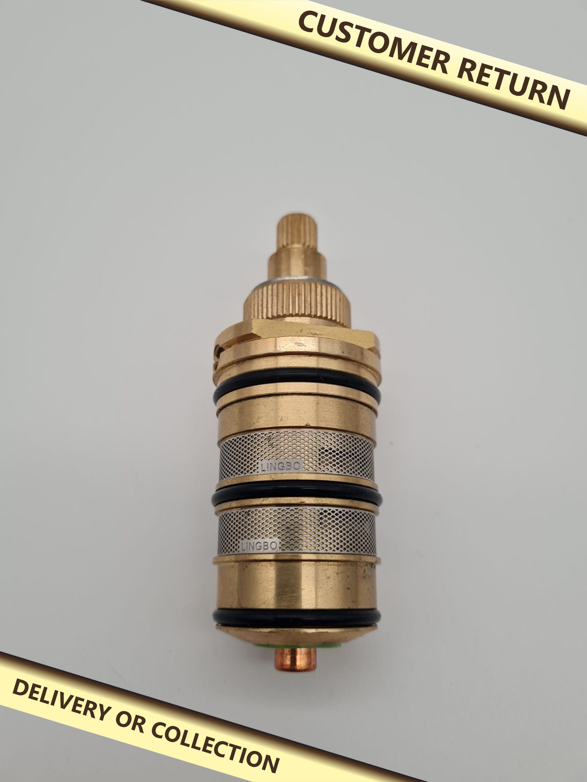 Thermostatic Mixer Valve Cartridge — photograph 1 — Customer return; auction delivery information shown on image
