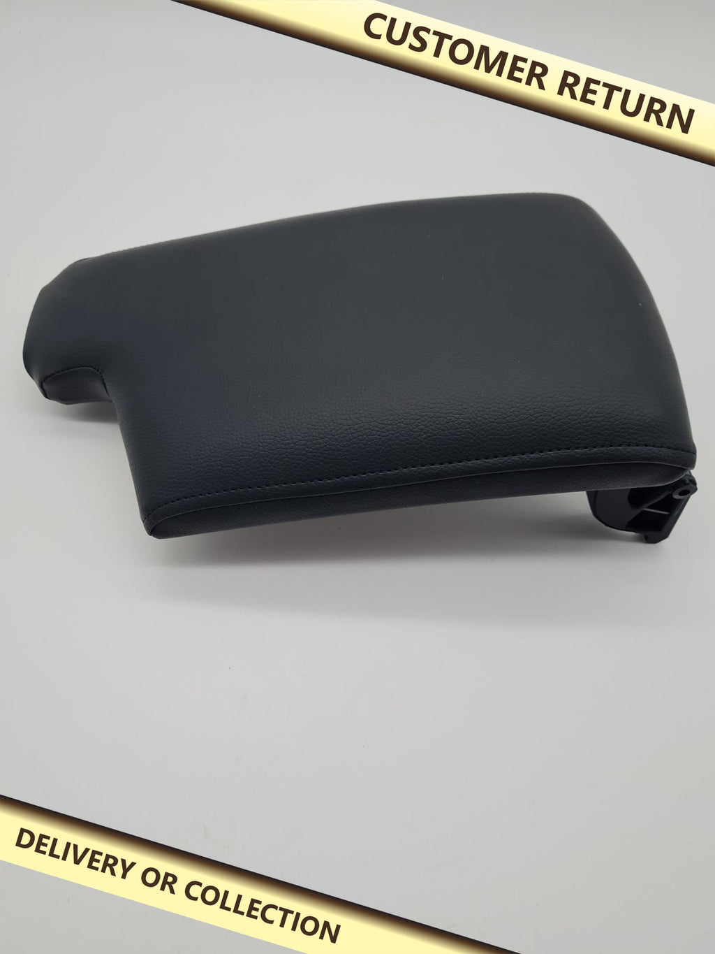 Vehicle Centre Console Armrest Lid — photograph 1 — Customer return; auction delivery information shown on image