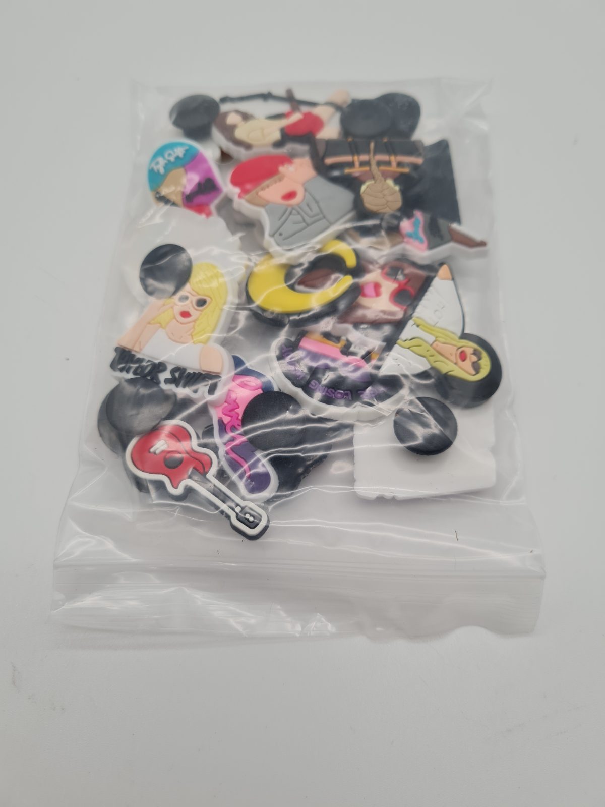 Assorted Decorative Shoe Charms — photograph 1