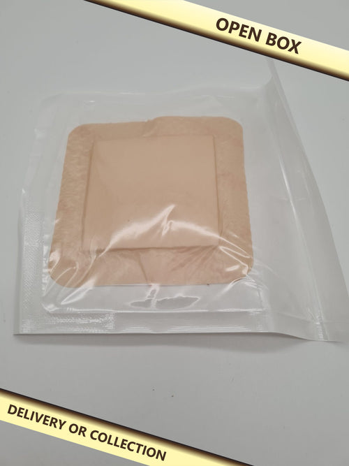 15 pack of Disposable adhesive cover patches — photograph 1 — Open box; auction delivery information shown on image