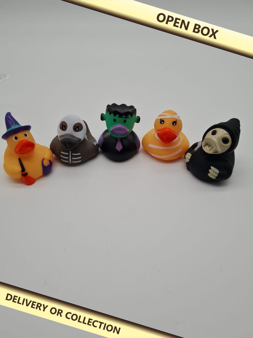 10 pack Halloween Duck Bath Toy Set — photograph 1 — Open box; auction delivery information shown on image