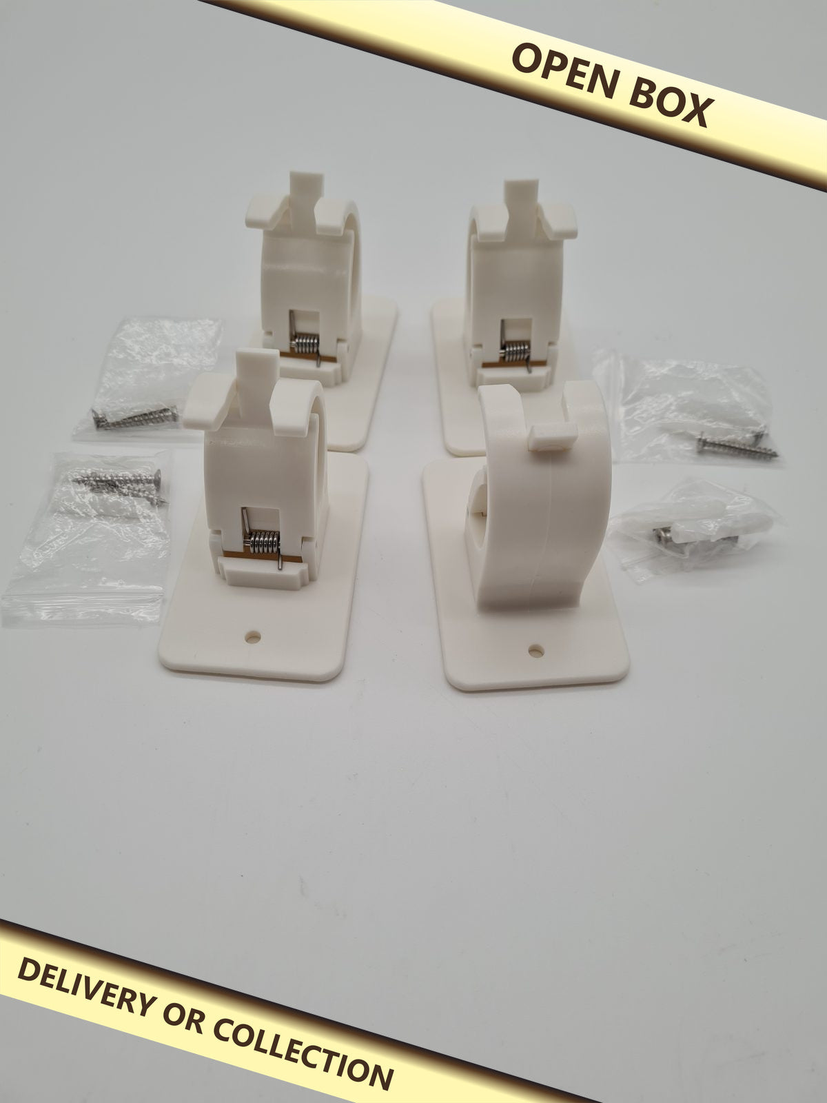 Curtain rod holder brackets 4 pack — photograph 1 — Open box; auction delivery information shown on image