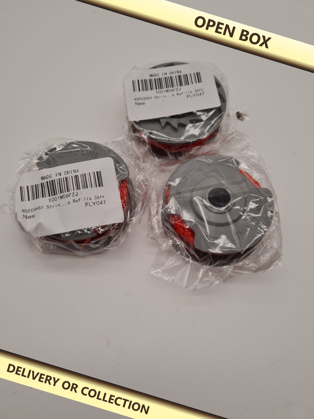 Strimmer Line Spool Refills FFLY04 — photograph 1 — Open box; auction delivery information shown on image
