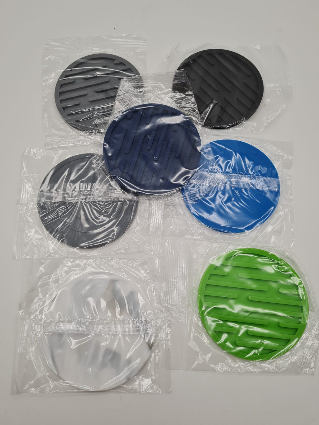 Set of 7 Round Silicone Drinks Coasters — photograph 1